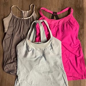 Lot of 3 Lululemon Tank Tops  Colors: Hot Pink, Grey, Light Blue. Size: 6